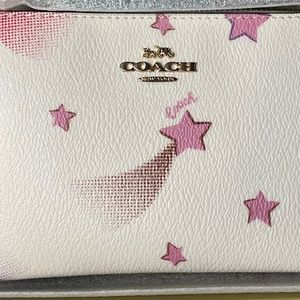 Coach pink and white wristlet